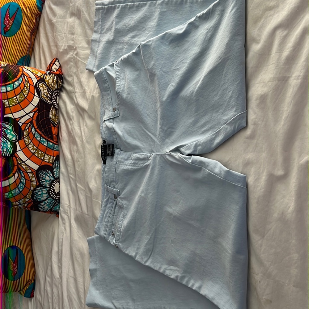 Light blue pants - 27% nylon 20% rayon 3% spandex front pockets back pockets.